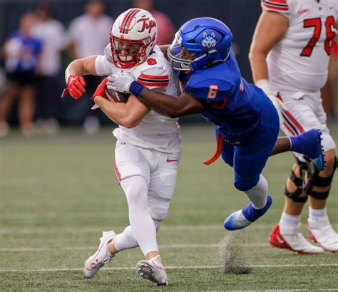 Austin Reed throws for 2 TDs, runs for another to lead Western Kentucky to 41-24 win in opener